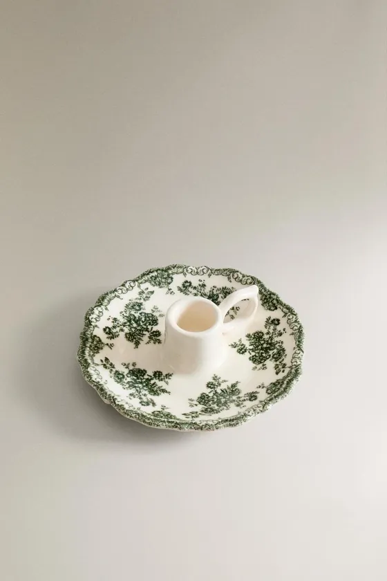 глиняный подсвечник с цветочным рисунком