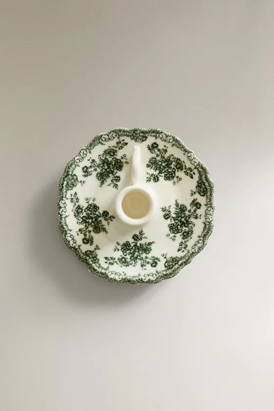 глиняный подсвечник с цветочным рисунком
