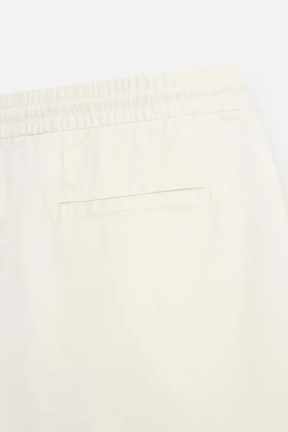 ШОРТЫ RELAXED FIT ИЗ ТКАНИ С ЭФФЕКТОМ ПОТЕРТОСТИ