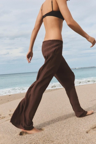 Брюки из ткани с рельефным узором- Заказать в России