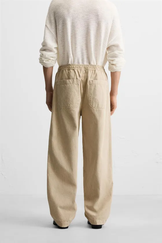 БРЮКИ RELAXED FIT С ЭФФЕКТОМ ПОТЕРТОСТИ