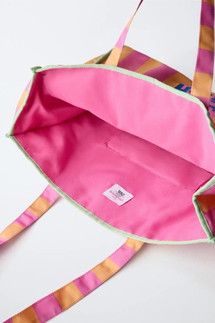 Покупатель в полоску с принтом «лило и шов» ©- Заказать в России