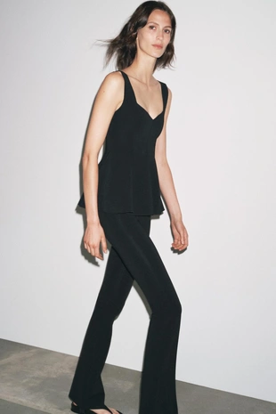 Топ из эластичной ткани с баской- Заказать в России