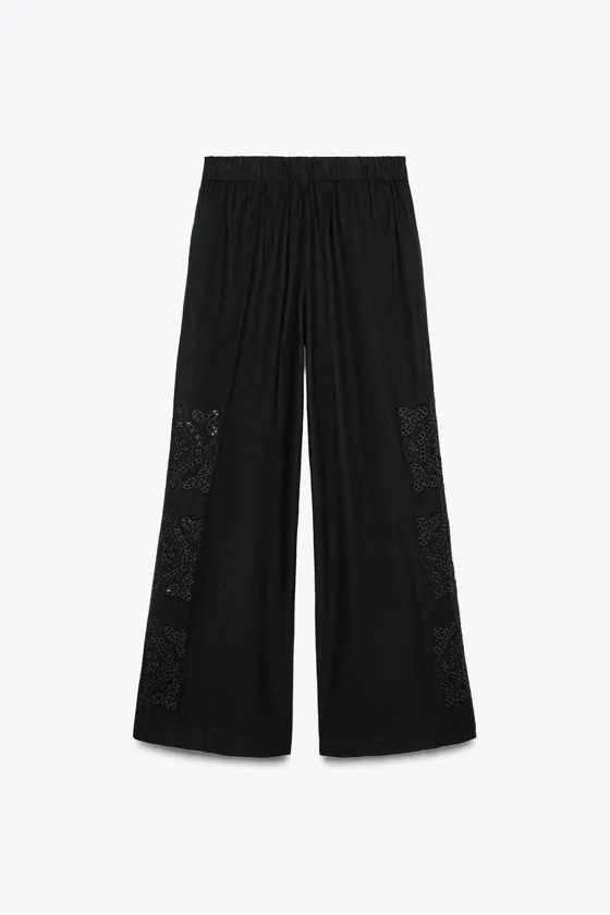 БРЮКИ С ВЫШИВКОЙ И ЗАЩИПАМИ