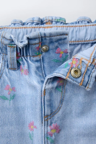 Джинсы  с цветочным принтом- Заказать в России