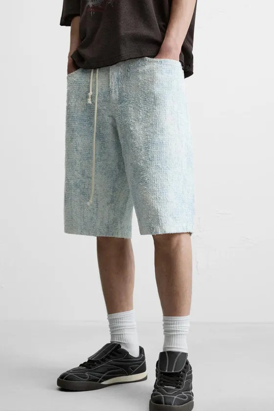 ШОРТЫ BAGGY FIT С НЕОБРАБОТАННЫМИ КРОМКАМИ