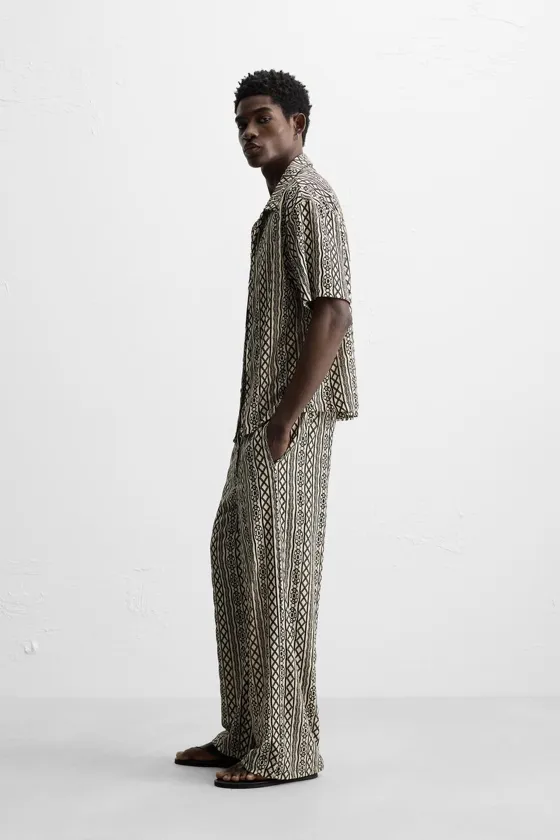 ЖАККАРДОВЫЕ БРЮКИ RELAXED FIT С ПЕРФОРАЦИЕЙ