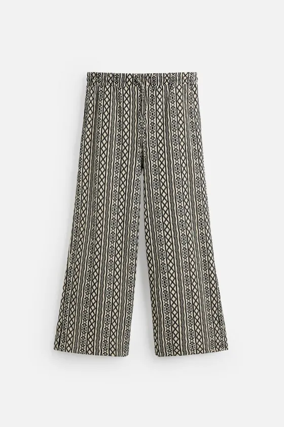 ЖАККАРДОВЫЕ БРЮКИ RELAXED FIT С ПЕРФОРАЦИЕЙ
