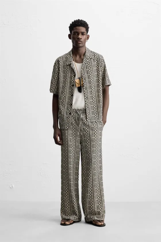 ЖАККАРДОВЫЕ БРЮКИ RELAXED FIT С ПЕРФОРАЦИЕЙ