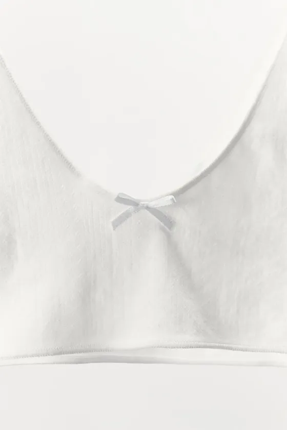 ПЕРФОРИРОВАННЫЙ БРАЛЕТТ С АТЛАСНЫМ БАНТИКОМ