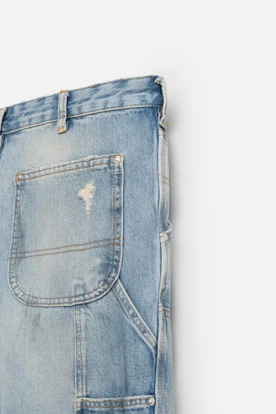 БРЮКИ КАРГО ОВЕРСАЙЗ ИЗ СТИРАННОГО ДЕНИМА С КАРМАНОМ