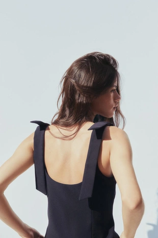 Топ из эластичной такни с бантами