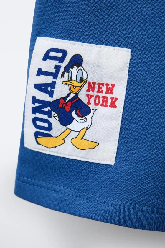 ШОРТЫ-БЕРМУДЫ С ПРИНТОМ DONALD DUCK © DISNEY