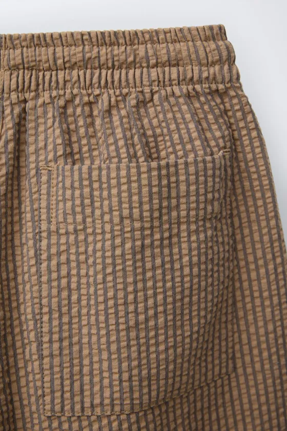 БРЮКИ BAGGY ИЗ РЕЛЬЕФНОЙ ТКАНИ В ПОЛОСКУ