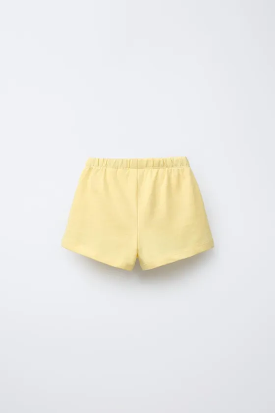 ШОРТЫ-БЕРМУДЫ С ВОЛНИСТЫМИ ДЕТАЛЯМИ CASA LAWA © X ZARA KIDS