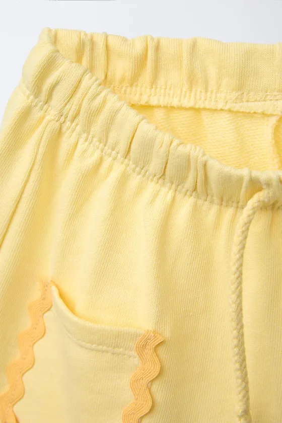 ШОРТЫ-БЕРМУДЫ С ВОЛНИСТЫМИ ДЕТАЛЯМИ CASA LAWA © X ZARA KIDS