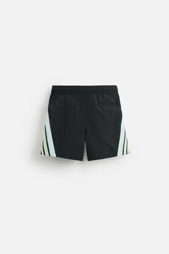 КУПАЛЬНИК СРЕДНЕГО РАЗМЕРА В КОНТРАСТНУЮ ПОЛОСКУ