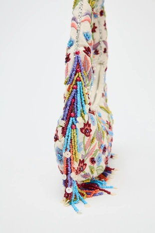 Овальная сумка с цветочной вышивкой- Заказать в России