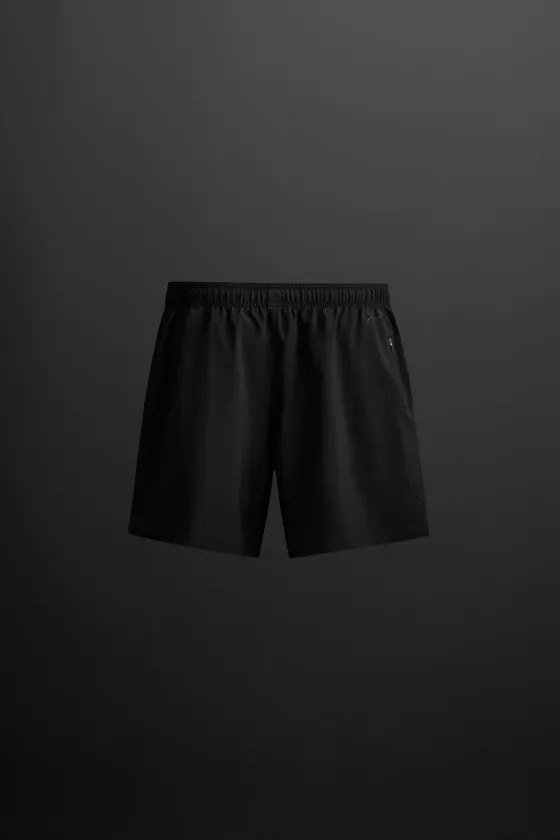 СПОРТИВНЫЕ ШОРТЫ С ПЕРФОРАЦИЕЙ