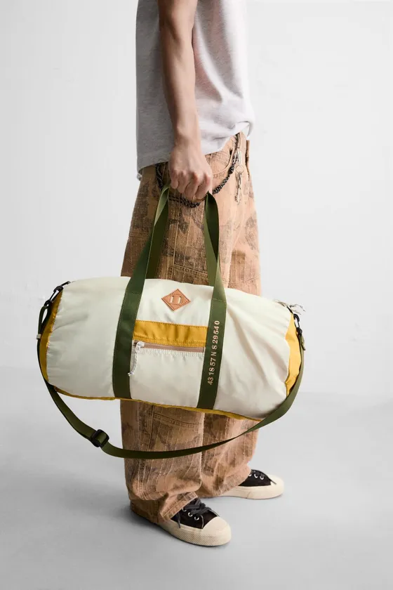 CONTRAST TRAVEL BAG
