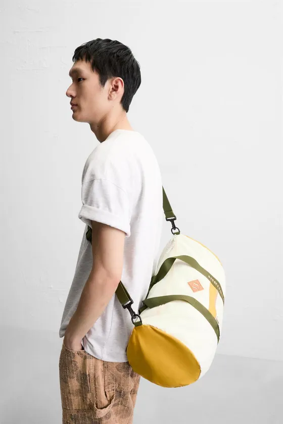 CONTRAST TRAVEL BAG