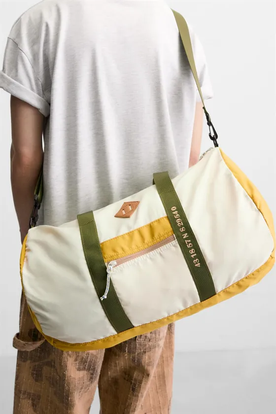 CONTRAST TRAVEL BAG