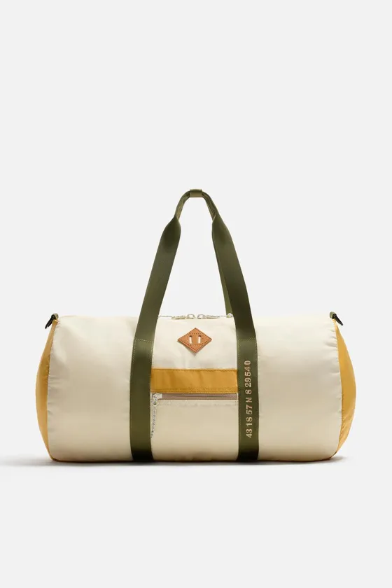 CONTRAST TRAVEL BAG