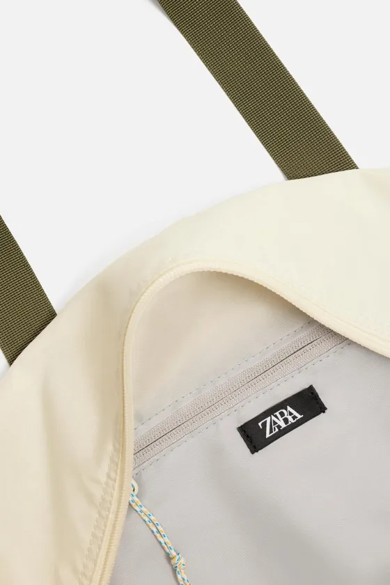 CONTRAST TRAVEL BAG