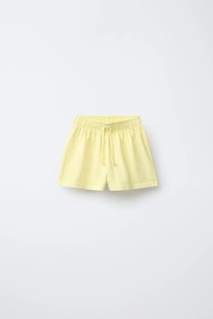 Комплект из футболки и шортов, окрашенный в готовом виде