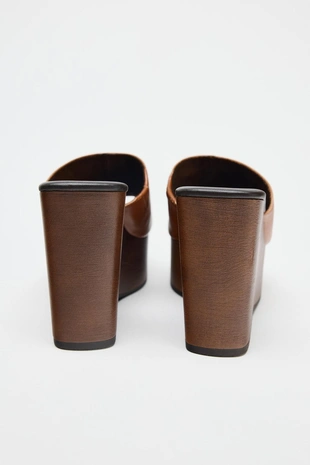 Кожаные туфли на танкетке- Заказать в России