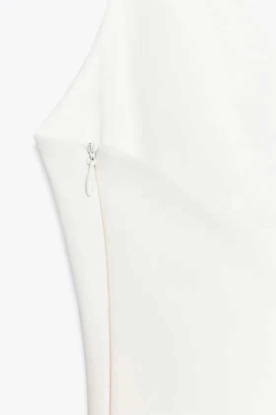PEPLUM STRETCH TOP