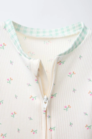 Две пижамы-комбинезона в клетку и с цветочным принтом- Заказать в России