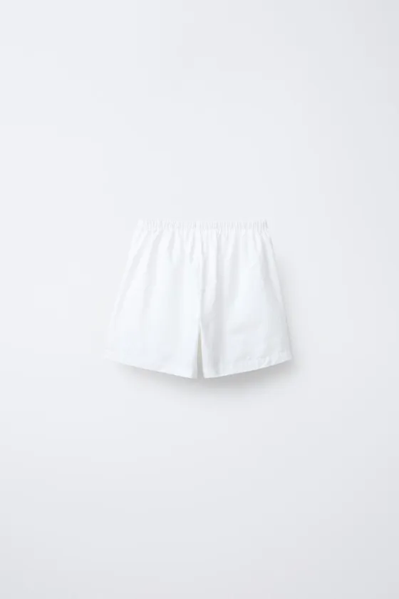 ШОРТЫ С ЦВЕТОЧНЫМ ПРИНТОМ И БУСИНАМИ