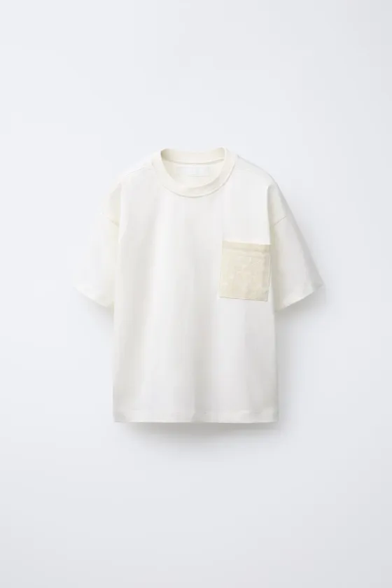 ФУТБОЛКА С ПРИНТОМ НА КАРМАНЕ