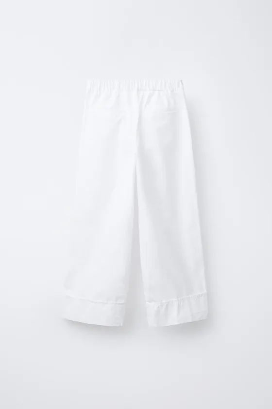 БРЮКИ ИЗ ПОПЛИНА С ПУГОВИЦАМИ И СТРАЗАМИ