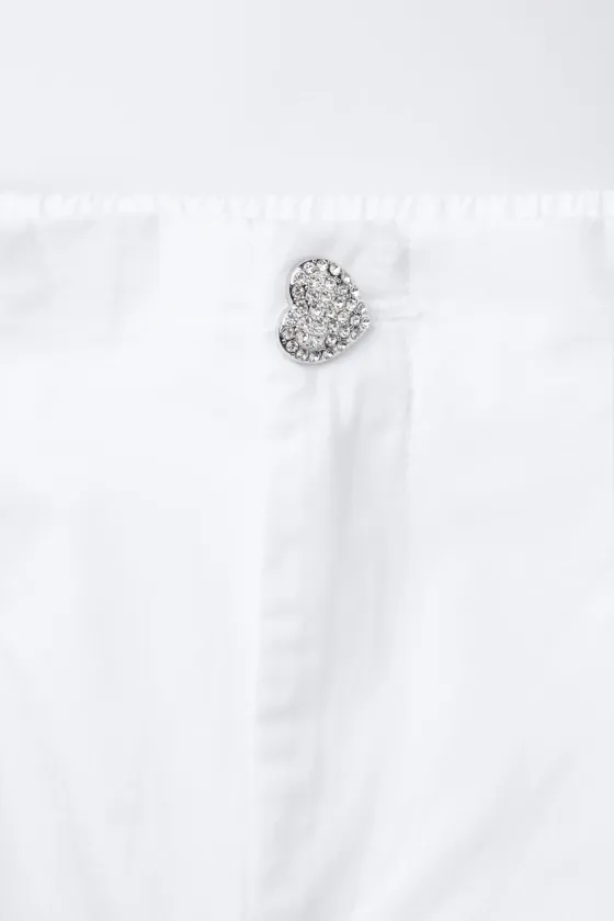 БРЮКИ ИЗ ПОПЛИНА С ПУГОВИЦАМИ И СТРАЗАМИ