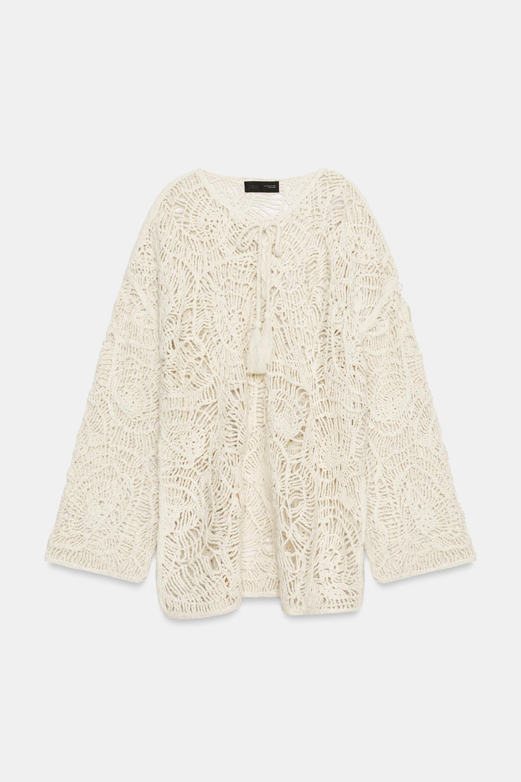 Платье с отделкой кроя крючком и кисточками