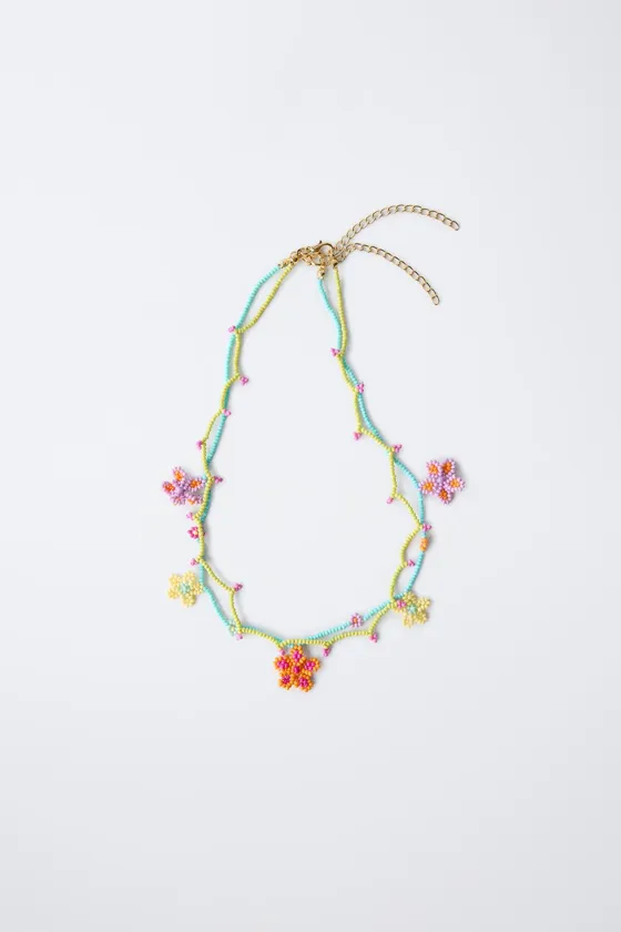 PACK OF TWO NECKLACES WITH FLOWER BEADS