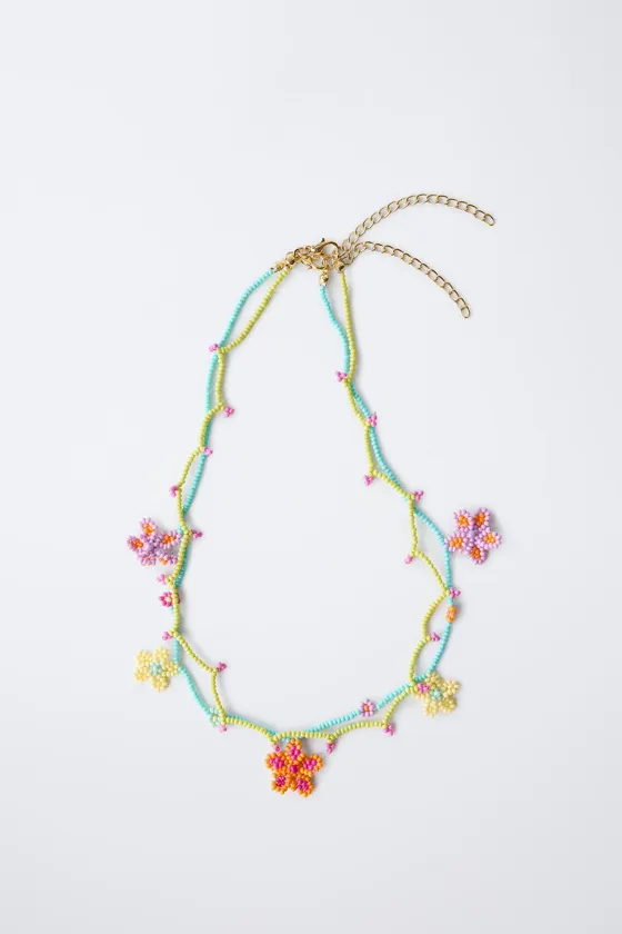 PACK OF TWO NECKLACES WITH FLOWER BEADS