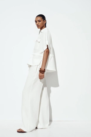 Брюки с широкими штанинами и эластичной талией- Заказать в России