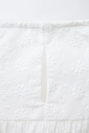 Комбинезон с текстурой и швейцарской вышивкой- Заказать в России