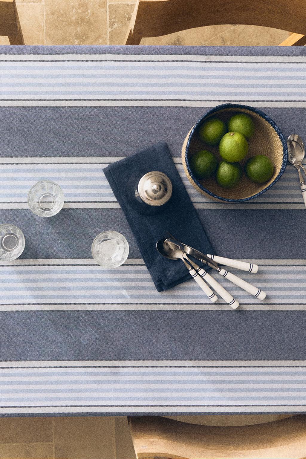 Cotton tablecloth with a coloured stripe design in dyed thread