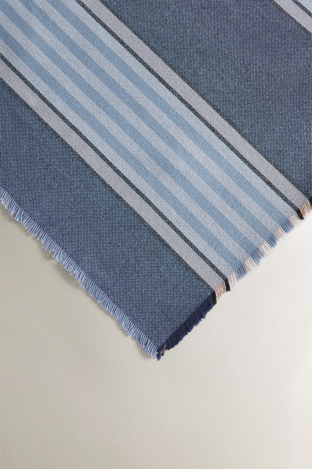 Cotton tablecloth with a coloured stripe design in dyed thread