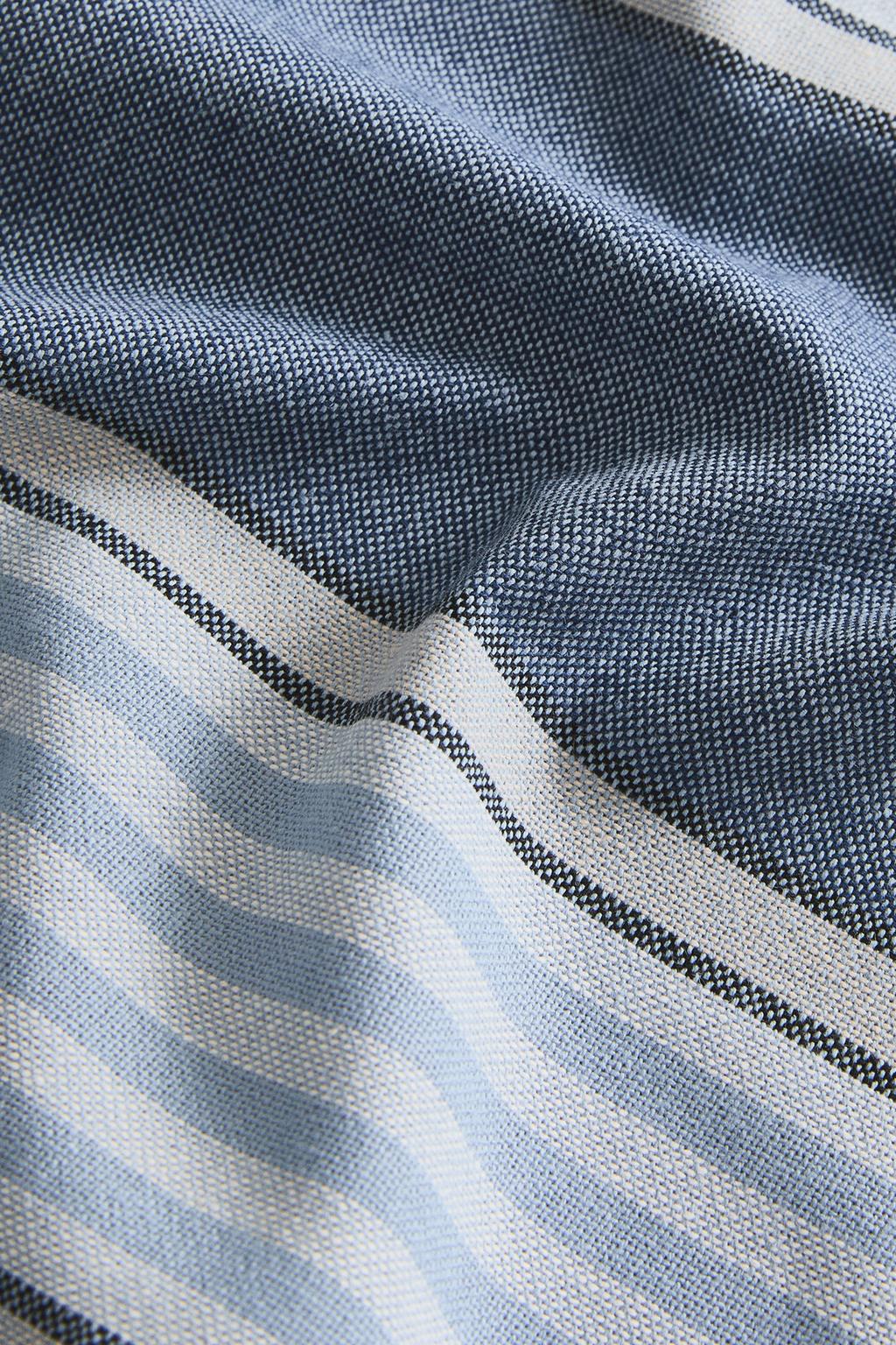Cotton tablecloth with a coloured stripe design in dyed thread