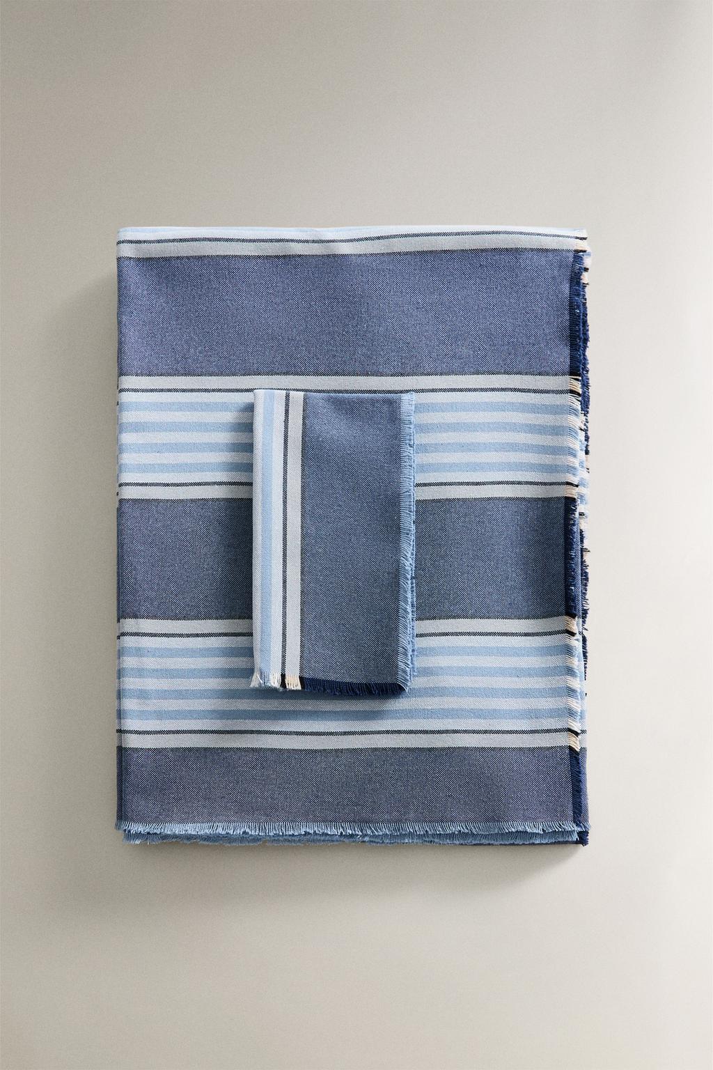 Cotton tablecloth with a coloured stripe design in dyed thread