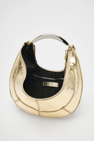 Овальная сумка с металлической ручкой- Заказать в России