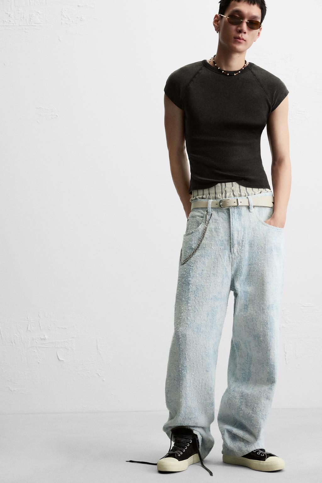 ДЖИНСЫ BAGGY FIT С ЭФФЕКТОМ ПОТЕРТОСТИ