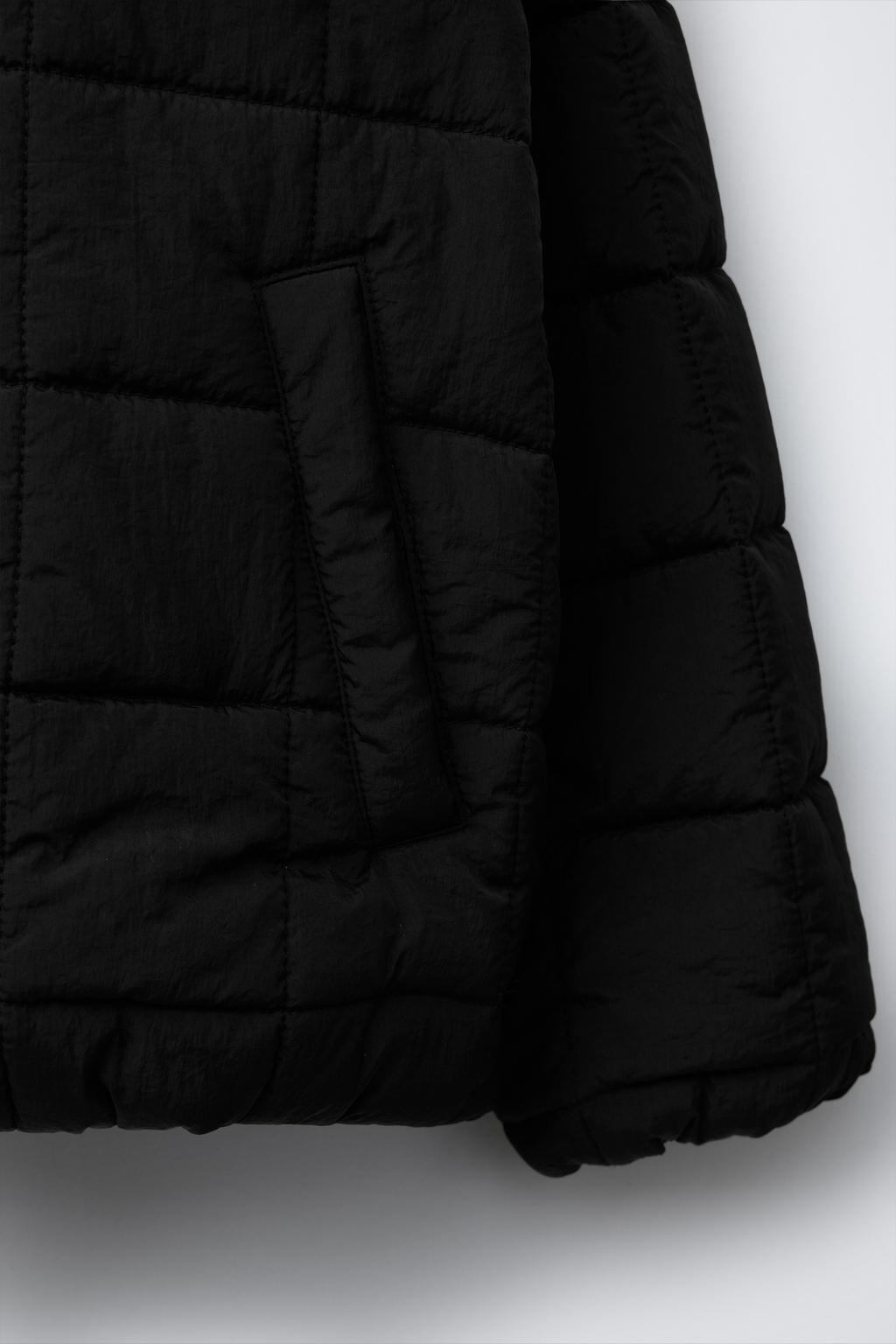 Легкая пуховая куртка