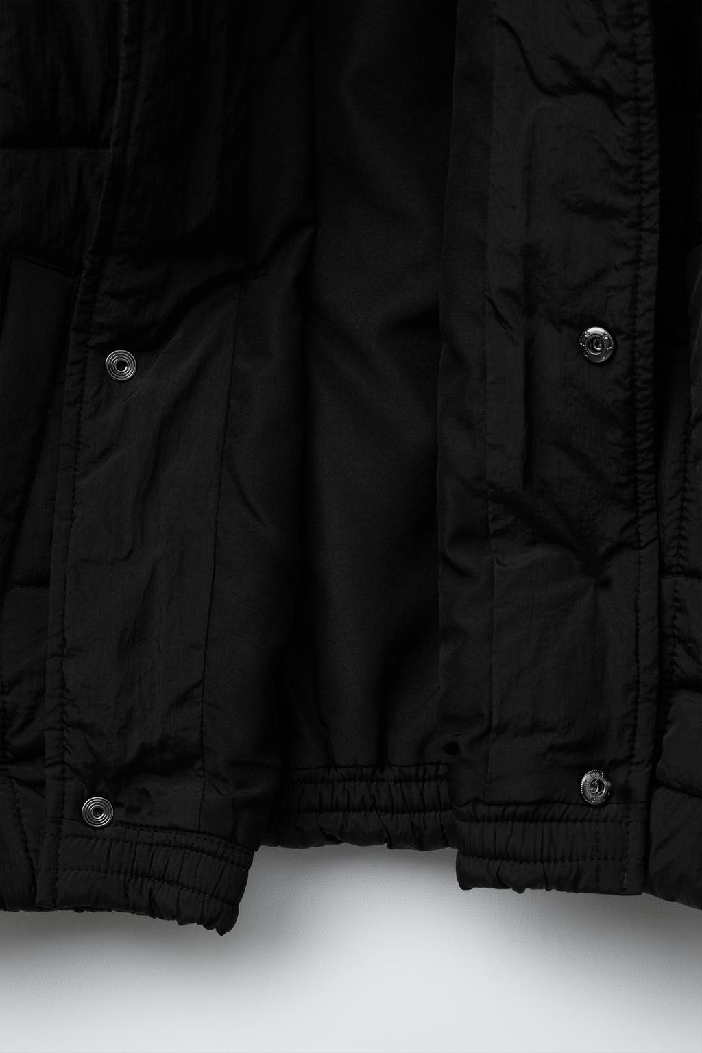 Легкая пуховая куртка