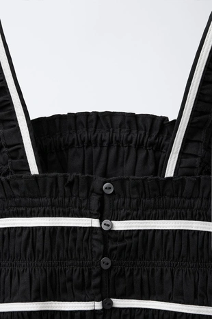 Платье с бантами и контрастной отделкой